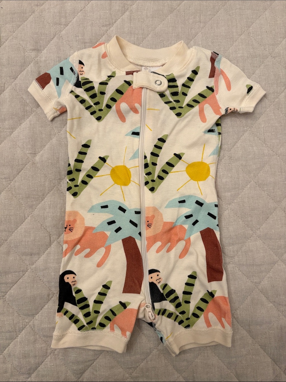 Hanna Andersson Cream One-Piece Romper with Tropical Animal Print